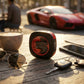 CTRL8 K7 true wireless earbuds showcased in a stylish black and red case on a cafe table with a luxury car in the background