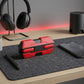 CTRL8 K8 true wireless earbuds in red placed on a desk with headphones, smartphone, and modern decor